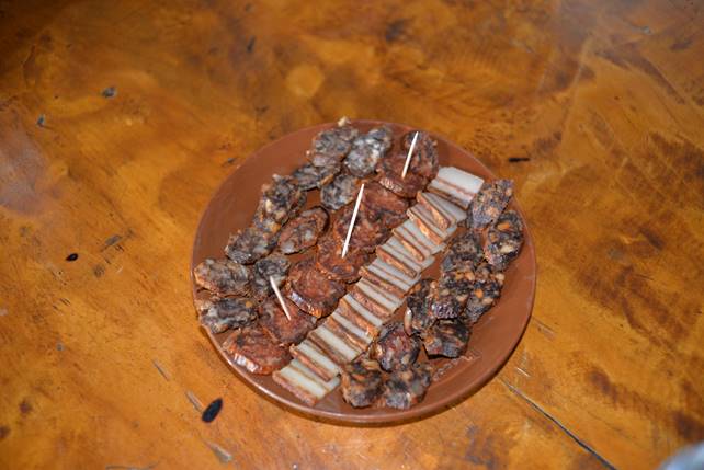 A picture containing table, food, floor, indoor

Description generated with very high confidence