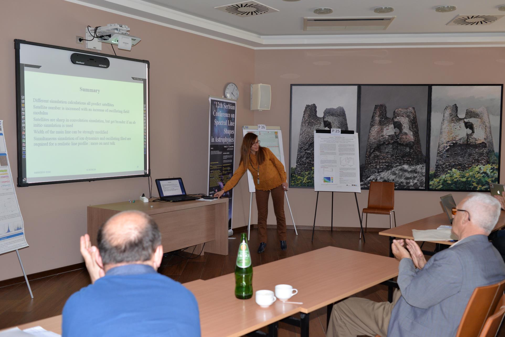 A group of people sitting at a table

Description automatically generated